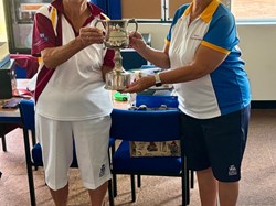 Wendy Cross receives the trophy for the County Ladies Top Club victory by Shiplake