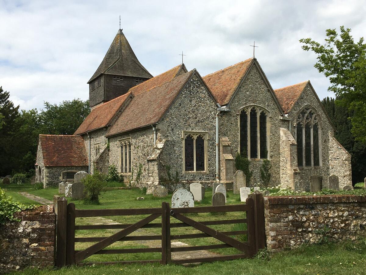 The 11th century church of St James the Great in Elmsted village, with its unusual 13th Century wooden belfry atop a stone tower.