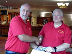 Trevor receives his runner up prize from Badgemore Park