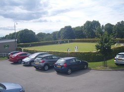 Veiw of green and car park