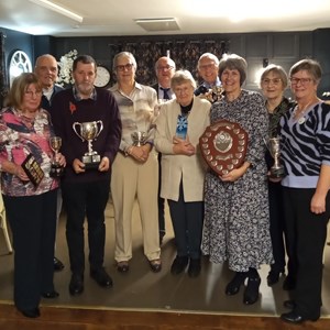 Trophy Winners 2025 L - R  Jeannie Hutton, Bruce Acock, Jonny Abbott, Liz Dyer, Richard Lambert, Liz Hosmer, Gordon Corby, Lorna Lambert, Colleen Laker & Clare Thomas