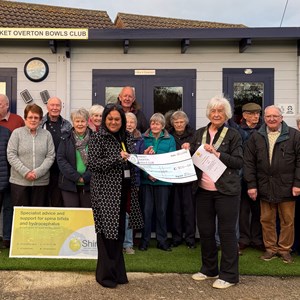 2025 President Annette Oliver and club members along with rep from her chosen charity SHINE