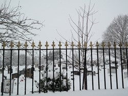 Cemetery gates in the snow