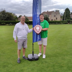 President Richard Lambert (L) presenting Jack Warner with the Britten Trophy in recognition of his outstanding contribution to the club in this most difficult of years.