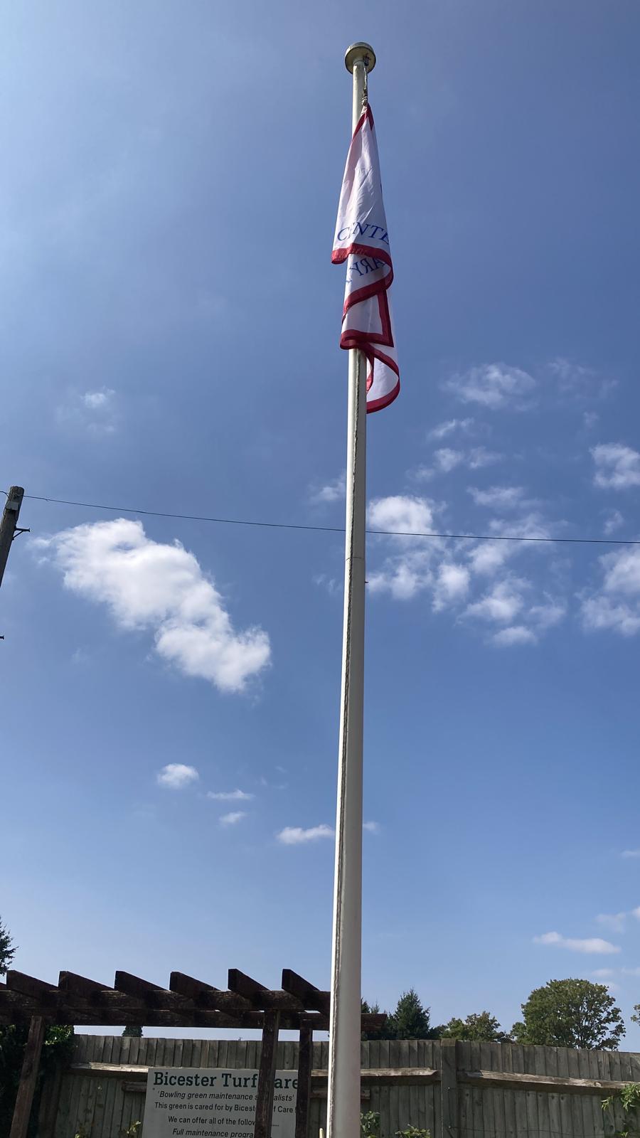 The flag is raised for the Top Club winners. Fortunately, they were not as limp as this. The flag is raised for the Top Club winners. Fortunately, they were not as limp as this.