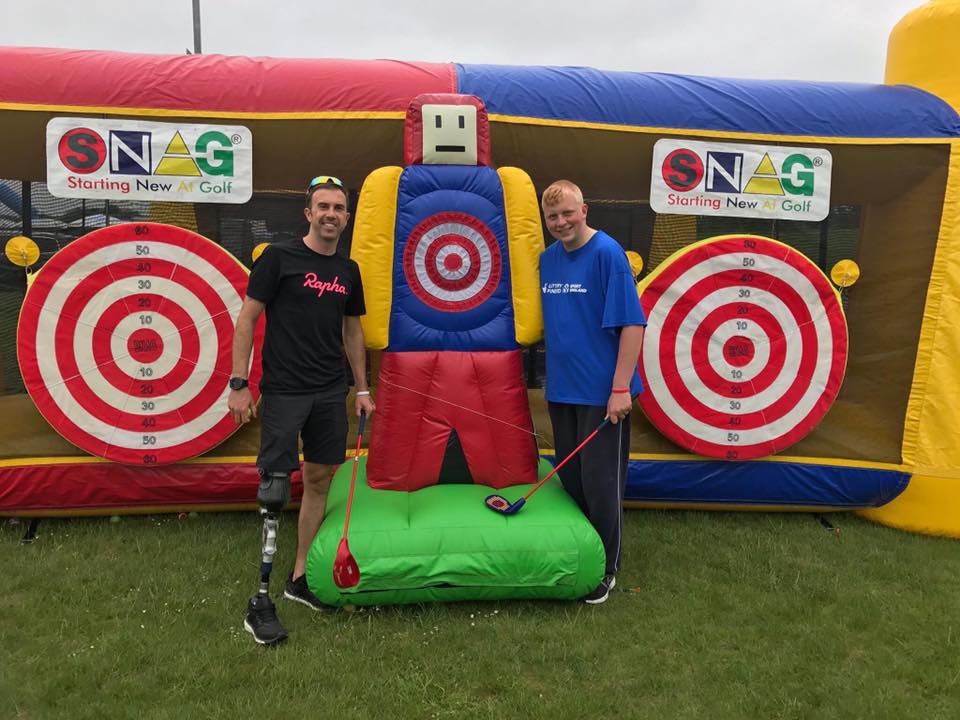 Andy Lewis (Left, Paralympic gold medalist) and Warren Clark (Right), with the S.N.A.G inflatable.