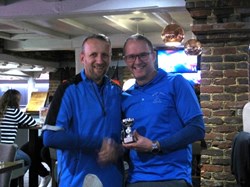 Tim is presented with the Clothier cup by Mike