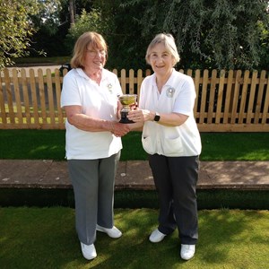 Ladies club champion Jeannie Hutton receiving trophy from runner up Colleen Laker