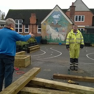 Building raised flowerbed for school