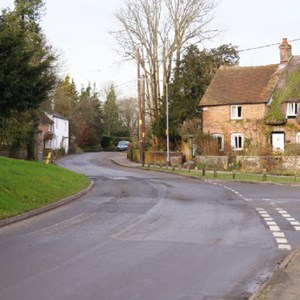 Hill Road looking towards Rectory Road with Forge Cottage on the right