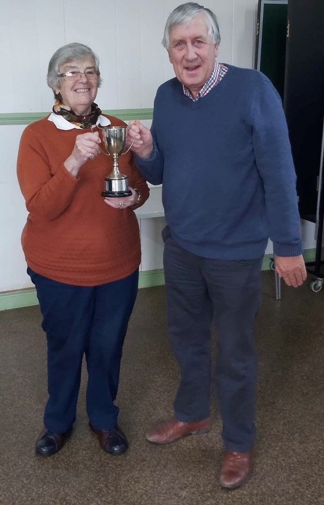 Mrs Kathleen Dennis being presented with the Parish Cup by parish council chairman, Martin Stanbury. Kathleen was recognised for all the work she does in the parish.