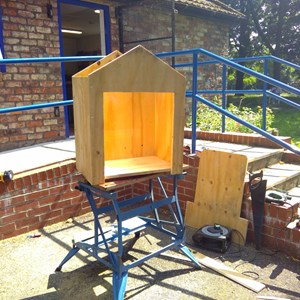 Outside bookcase taking shape for the charity "Bookcase for All"