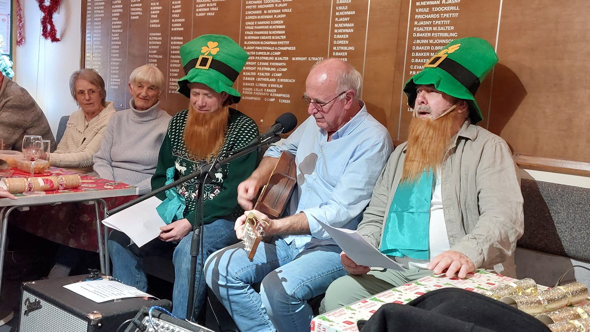 Bern with his backing group at the Christmas social, 2025