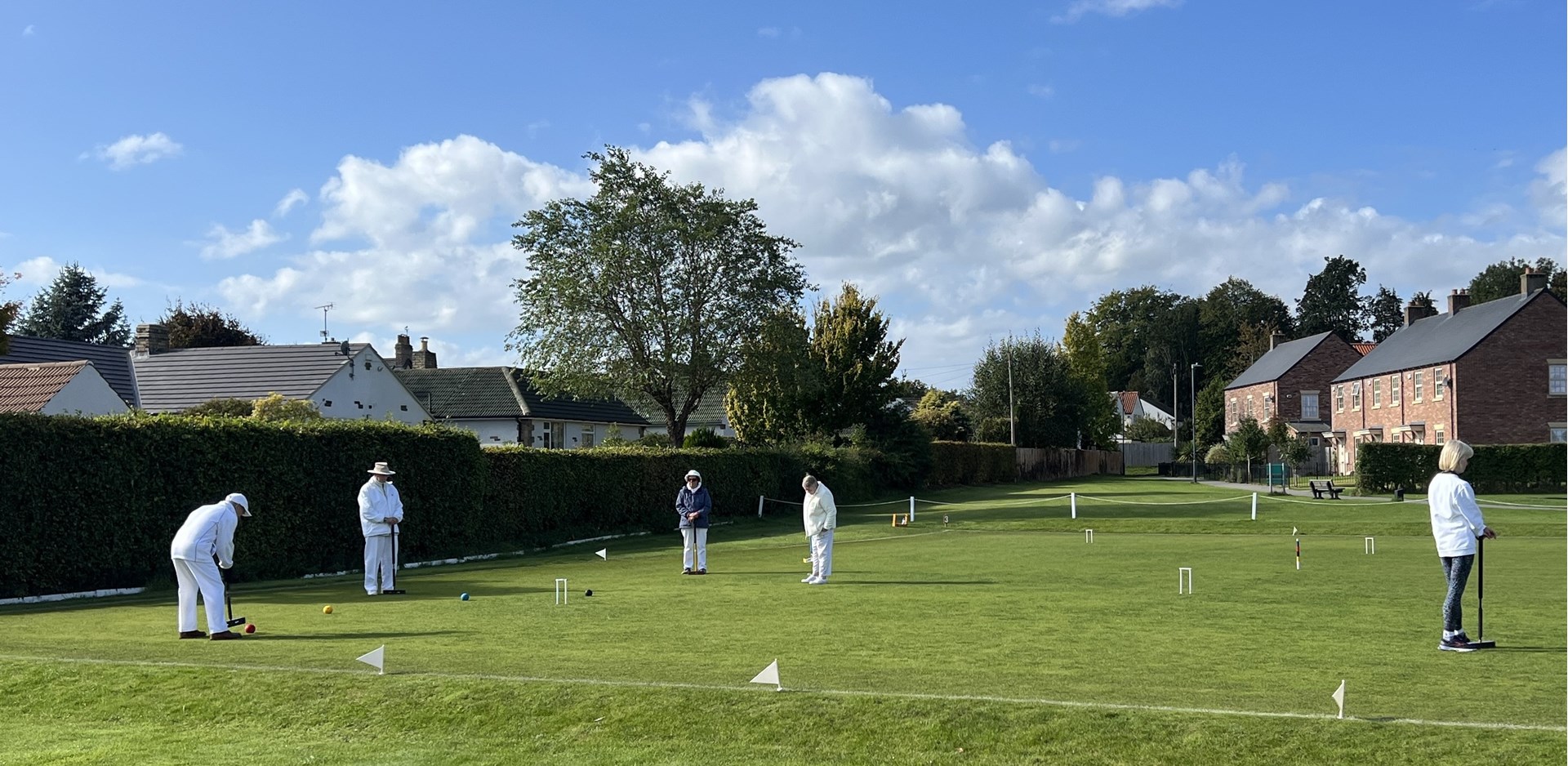 Progressive Doubles Day-In play on two flat full-size lawns Progressive Doubles Day-In play on two flat full-size lawns