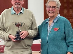 Graham Kennedy accepts the Trophy for the Captain v Chairman match winners.
