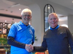Philip again shaking the captains hand whilst taking the nearest the pin prize