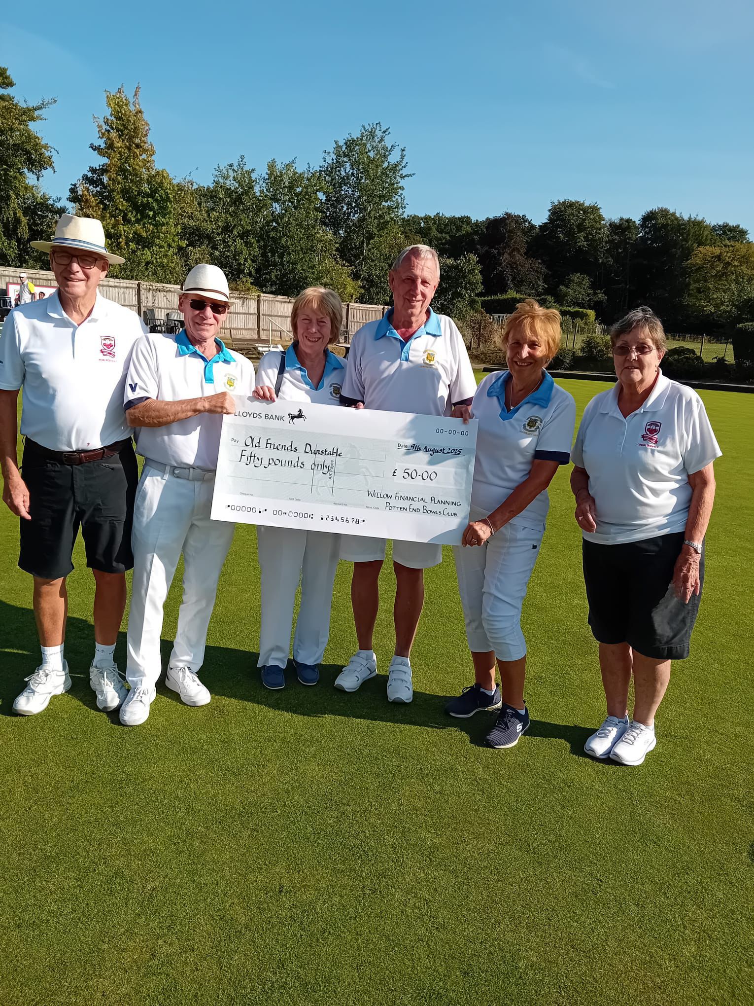 Brian, Sally, Peter and Kay receiving their prize