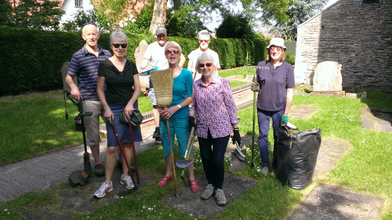 working party tidying up the churchyard, well done everyone