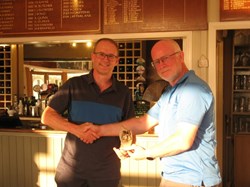 Tim again collecting the eclectic trophy won with 44 points