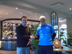 Richard receives the winners prize and captains handshake