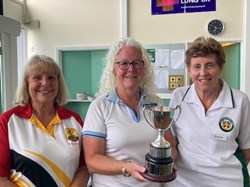 Chris Wooton receives the Harvey Cup from North& Cuffley and Potters Bar captains
