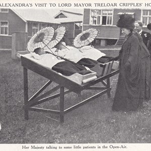 Queen Alexandra's visit to Lord Mayor Treloar Cripples' Hospital ~ Her Majesty talking to some little patients in the Open-Air - 26th July 1912