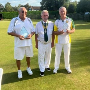 President Neil Fish presenting the winners Taylor Memorial Trophy to Graham Ward, and runner up John Heslam