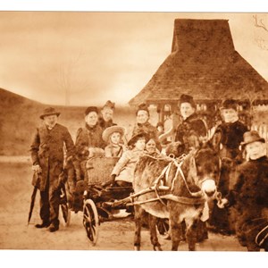 Bryant family outside lych gate. circa 1890