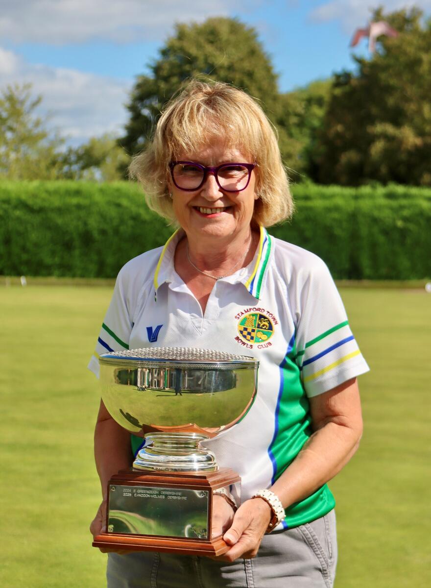 National champion Sue Seed with the Ivy Younger Secretaries Singles trophy