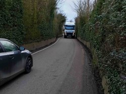 HGV causes oncoming traffic to reverse back to The Sun public house