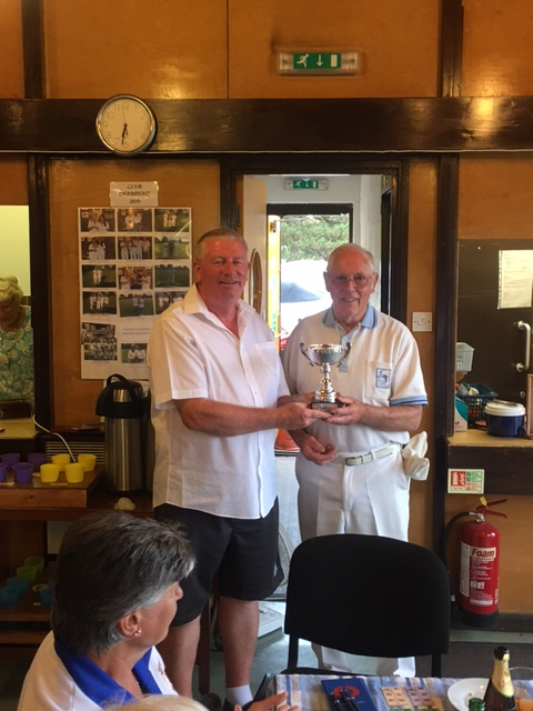 Dave Cooper presenting the Delsa Cooper Cup to the Rye Park Captain