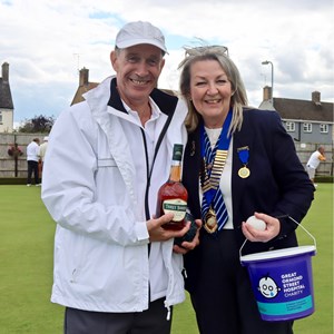 Winner of the 'Spider' competition John Suffling with Rita Downs.