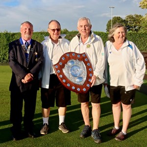 President Dusty Miller with Duncomb Shield winners John Holroyd, Kevin Vinter and Moira Holroyd