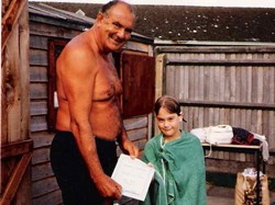 Katharine Thow receiving a Certificate from Stan Stott