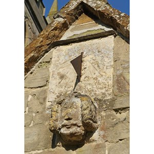 May 15th    SUNDIAL & CARVED HEAD    The sundial on the church porch is dated 1616.  Do you think the carving below is Charles I (1600-1649)?