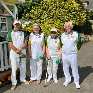Club President Kelvin McIldoon standing alongside Keith McGrady, Susan Cookson, and Jill Meacher who were runners up in the John Bull Triples Trophy on Saturday 29th June.