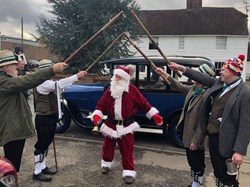 Father Christmas arrives with guard of honour from Morris dancers