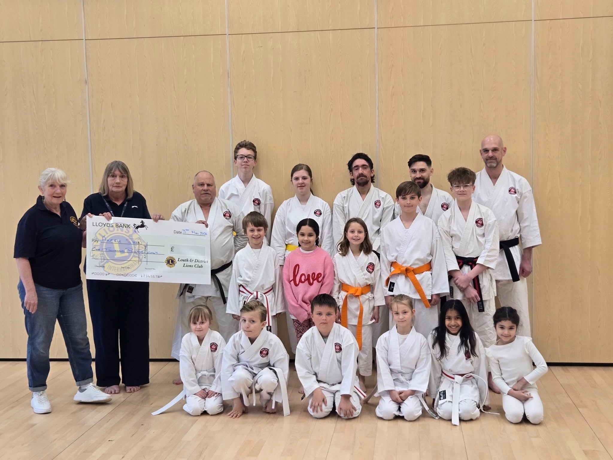 Cheque presentation by Lion President Sam & Lion Sue