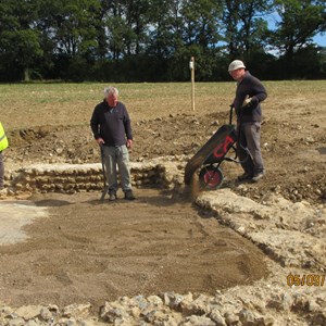Steve and Paul barrowing and spreading whilst Mark was shovelling.