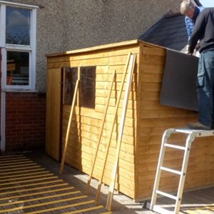 Building  a storage shed for Highcliffe Library