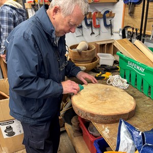 Peter Hoyle hard at work in the Men's Shed workshop