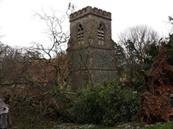 Ellisfield Church, fallen tree, broken weather vein, but a full tower. ©PT