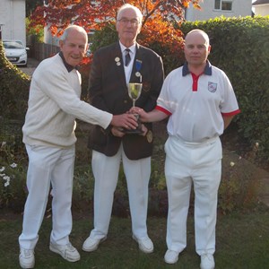 Gentleman's Pairs Finals: Richard Pope and Peter Winn receiving their cup from President Richard Stocking