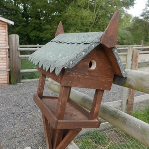 Combined bird table and nest box