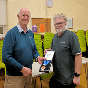 Mr David Steed presenting the Chairman's Jewel to Cllr Bell, 2026