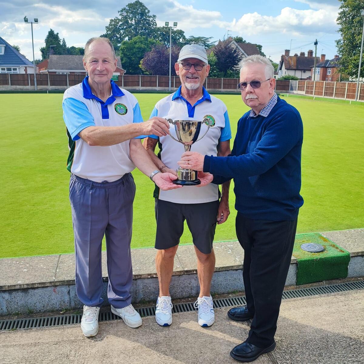 Men’s pairs winners John Little and Steve Evans. Trophy presented by Peter Cooke.