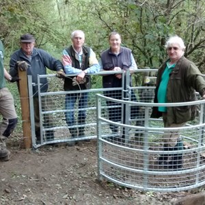 HCC Countryside team and Ramblers volunteers installing kissing gates.