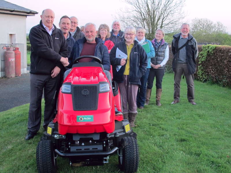 Presentation of new lawnmower to the Arscott Hall Committee