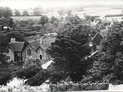 View NW from church tower - school and village amongst trees, 1930-1939 (Antona 2966)