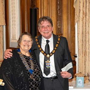 Lion President Janet presenting donation to Mayor Antony Bartolla's charity